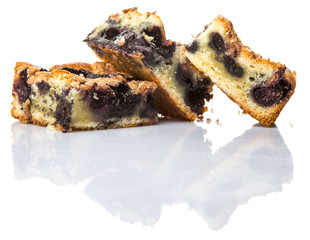 Portions of blueberry sponge cake over white background