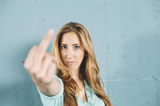 Young woman giving the finger