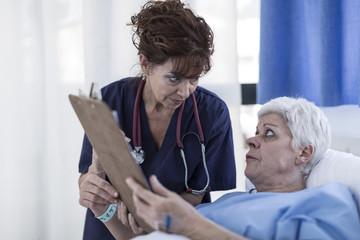 Doctor explaining patient advance directive