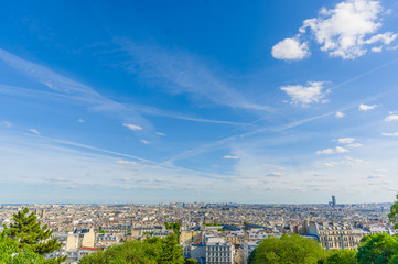 Impressive summer view of Paris from Montmartre hill, France