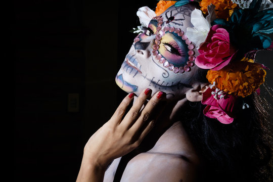 Woman dressed as La Calavera Catrina, Traditional Mexican female skeleton figure symbolizing death