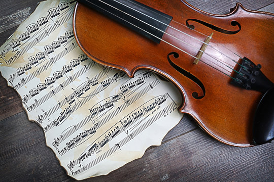 violin with music sheets