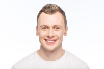 Obraz premium Handsome man is smiling broadly. 