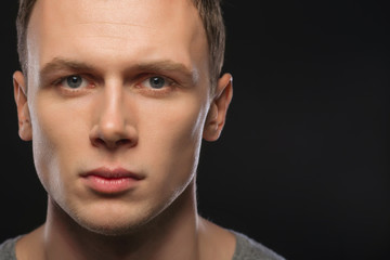 Obraz premium Handsome man looking serious. 
