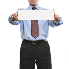 Businessman in blue shirt holds blank placard