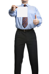 Businessman showing  thumb up and holding or presenting a blank