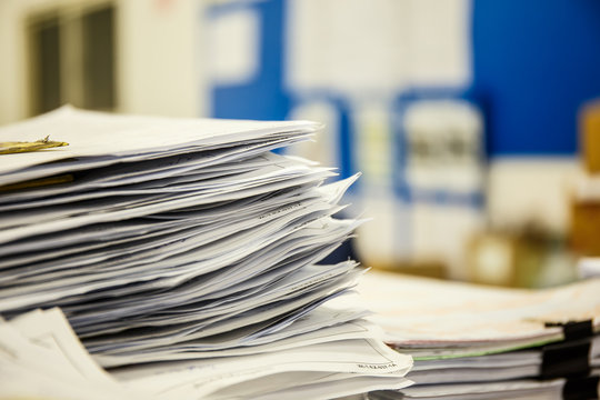 A pile of documents Desk
