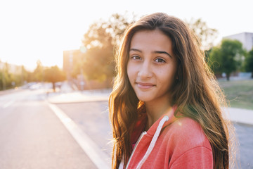 Portrait of happy girl at backlight