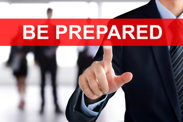 Businessman hand touching BE PREPARED tab on virtual screen