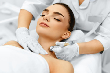 Obraz na płótnie Canvas Face Skin Care. Diamond Microdermabrasion Peeling Treatment, Bea