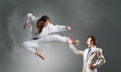 Fototapeta na wymiar Karate man in white kimino