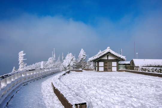 Deogyusan mountains is covered by snow and morning fog in winter