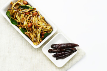 nut and green nut fried with fish for snack