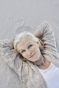 Best ager woman at the beach