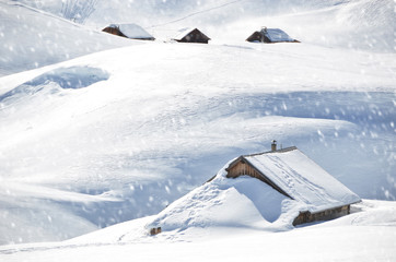 Farm house buried under snow, Melchsee-Frutt, Switzerland