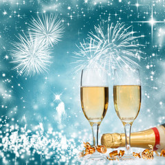 Champagne glasses against holiday lights