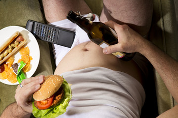 A man eats junk food