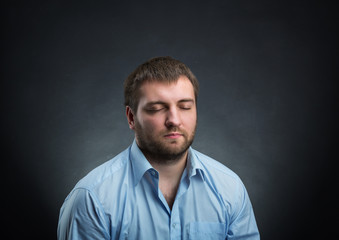 Obraz premium Man with closed eyes