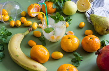 cocktails with mint garnish and the kumquats,mandarins
