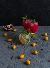 cocktails with mint garnish and the kumquats and pomegranate 