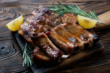 Closeup of freshly baked pork ribs, selective focus, studio shot