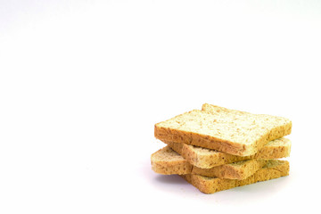 Fototapeta na wymiar Slice of a whole wheat bread isolated on a white background