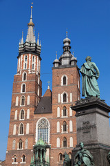 Fototapeta na wymiar St Mary Church and Adam Mickiewicz Monument
