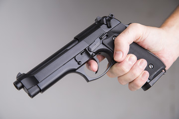 kller with a gun ready to fire