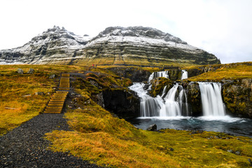 Obraz premium Waterfall near Kirkjufell, natural landmark of Iceland