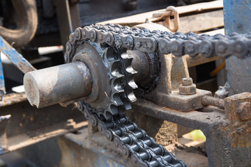 dirty chain and cogwheel in machine system