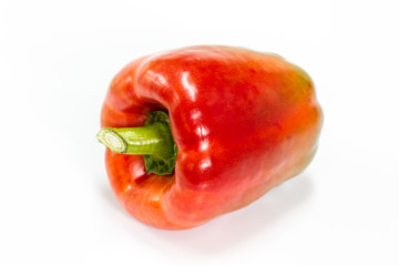 colored peppers over white background