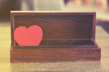 Valentine red heart in a box. Love concept