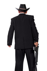 Gunman in black back-shot photo, isolated on white