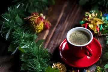 Cup of coffee with Christmas decorations.