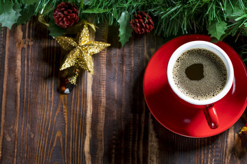 Cup of coffee with Christmas decorations.