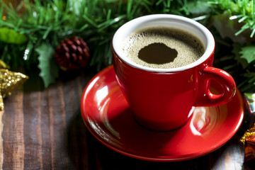 Cup of coffee with Christmas decorations.