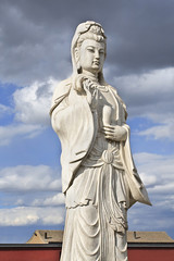White Sculpture of Guanying Pusa, the bodhisattva associated with compassion as venerated by East Asian Buddhists.