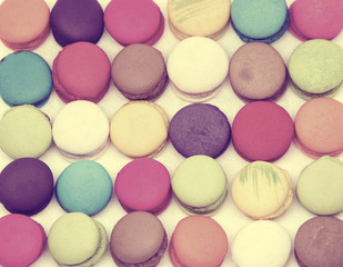 Fototapeta na wymiar Colourful tasty macaroons in a row.