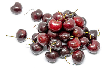  cherry berries on white background.