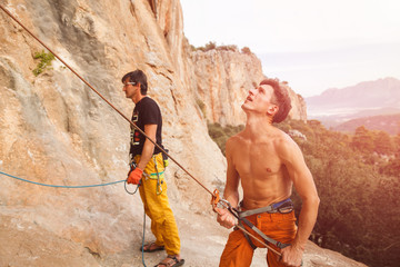 Two rock climbers on the cliff