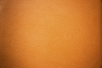 brown leather texture closeup can be used as background.