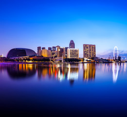 Singapore city at night with reflection