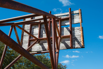 Basketball hoop is broken and wood board damaged ,Shiny wooden basketball
