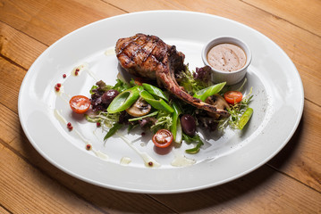 Entrecote steak meat with grilled vegetables.