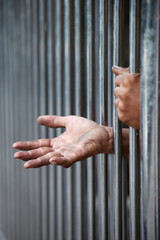 Obraz premium hand in jail