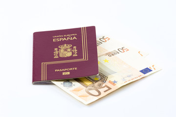 Fototapeta premium Spanish passport with european union currency in a wallet and map as a background 