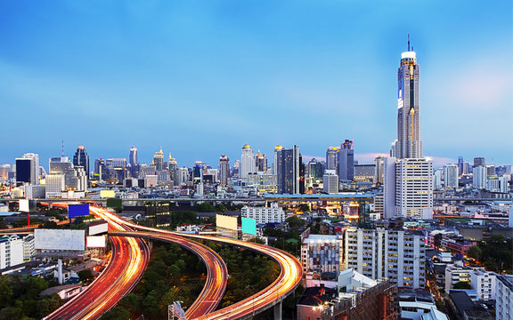 Cityscape twilight, Baiyok tower with traffic in Bangkok.