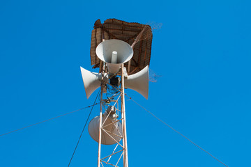 Loudspeakers broadcast ,Blue sky background