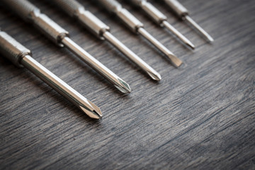 Set of screwdrivers on the wood table