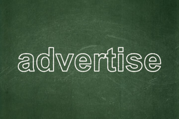 Obraz premium Marketing concept: Advertise on chalkboard background